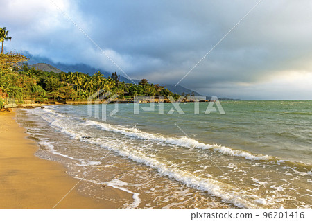 Sunset on one of the paradisiacal beaches on the island of Ilhabela Sunset on one of the paradisiacal beaches on the island of Ilhabela 96201416