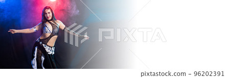 Banner Spirituality dance. Beautiful sexy woman with luxury glossy eastern make-up dancing tribal fusion. Belly dance copy space Banner Spirituality dance. Beautiful sexy woman with luxury glossy eastern make-up dancing tribal fusion. Belly dance copy space 96202391