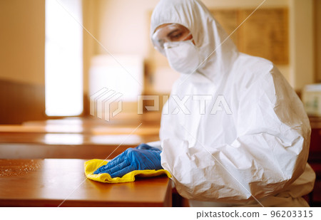 Cleaning and disinfection school desk during coronavirus pandemic. COVID-19. Cleaning and disinfection school desk during coronavirus pandemic. COVID-19. 96203315