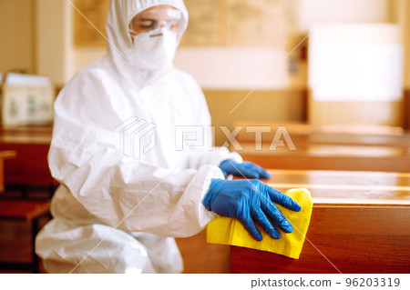 Cleaning and disinfection school desk during coronavirus pandemic. COVID-19. Cleaning and disinfection school desk during coronavirus pandemic. COVID-19. 96203319