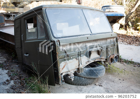 Broken abandoned rusty old vehicle. Retro damaged transportation. Broken abandoned rusty old vehicle. Retro damaged transportation. 96203752