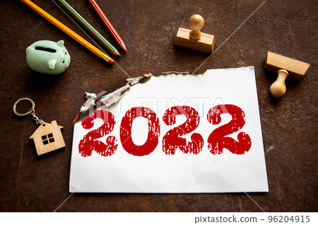 2022 review concept. Sheet of paper with text on a rusty metal background 2022 review concept. Sheet of paper with text on a rusty metal background 96204915