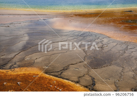 Beautiful geothermal landscape at Grand Prismatic Spring. Scenic view of steam emitting from Midway Geyser Basin. Famous tourist attraction at Yellowstone national park during summer. 96206756