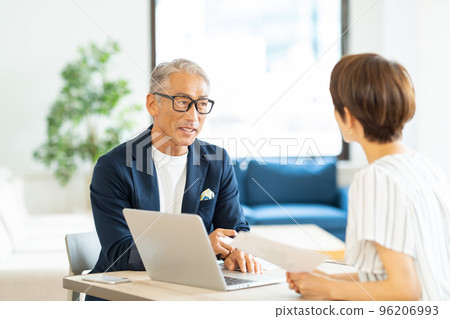 Senior businessman and middle woman 96206993