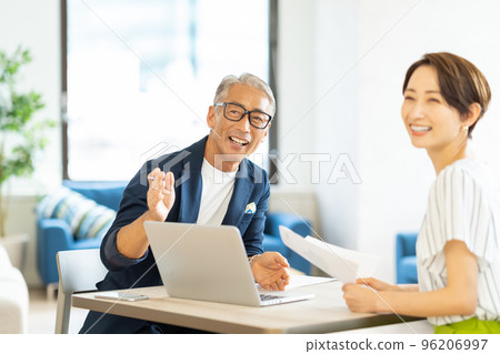 Senior businessman and middle woman Senior businessman and middle woman 96206997