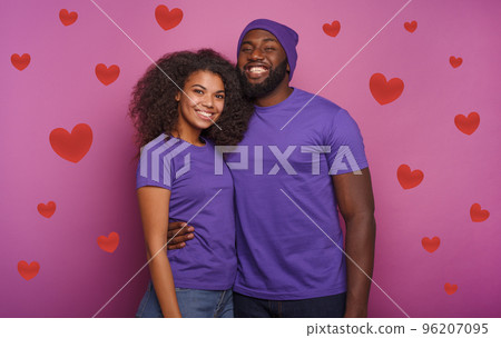 Happy couple are smiling. Concept of happiness. Purple background 96207095