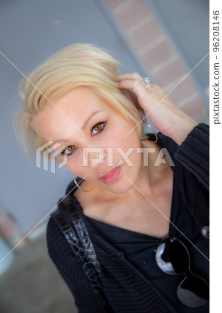 Pretty blonde woman portrait with hand Pretty blonde woman portrait with hand 96208146