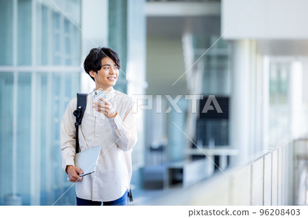 A man operating a smartphone 96208403