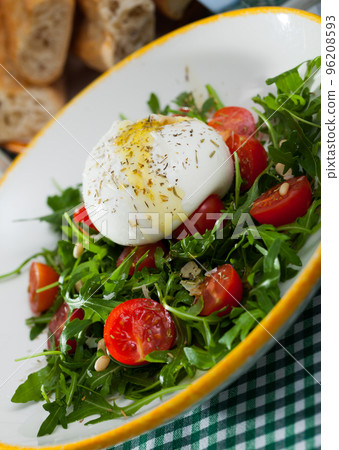Salad with Italian cheese burrata Salad with Italian cheese burrata 96208593
