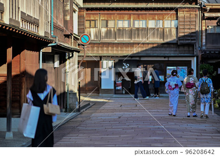 Kimono girls walking around Higashi Chaya district 96208642