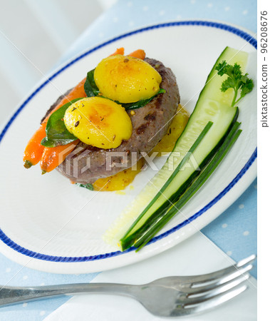 Beef rissole with new potatoes and carrot Beef rissole with new potatoes and carrot 96208676