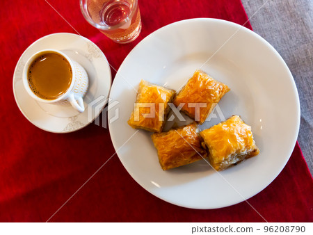 Turkish dessert baklava with honey and nuts Turkish dessert baklava with honey and nuts 96208790