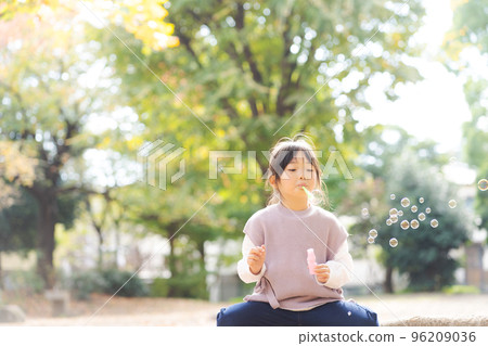 Children playing in the autumn park Children playing in the autumn park 96209036