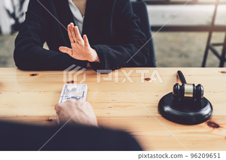 Corruption, law concept, government officials are refusing to accept corrupt payments from private equity owners who want to benefit their concessions. Corruption, law concept, government officials are refusing to accept corrupt payments from private equity owners who want to benefit their concessions. 96209651