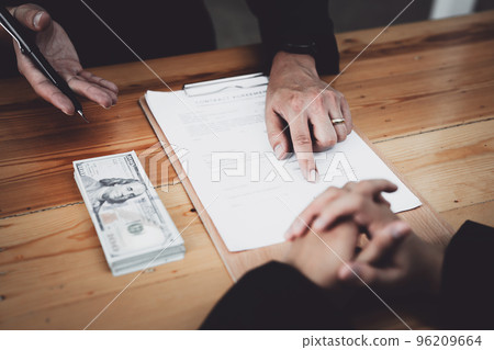 Corruption concept, law, civil servants sign government project documents and receive corruption money from private companies. Corruption concept, law, civil servants sign government project documents and receive corruption money from private companies. 96209664