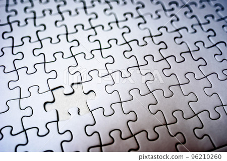 Jigsaw puzzle background texture, 1 remaining piece diagonal, clear shading 96210260