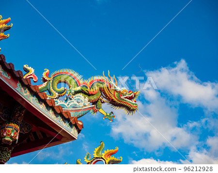 Asia culture concept - Roof with beautiful decoration of famous heritage landmark, the traditional old oriental Taiwanese temple. Asia culture concept - Roof with beautiful decoration of famous heritage landmark, the traditional old oriental Taiwanese temple. 96212928