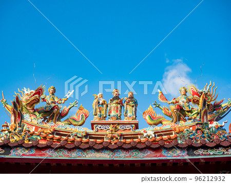 Asia culture concept - Roof with beautiful decoration of famous heritage landmark, the traditional old oriental Taiwanese temple. Asia culture concept - Roof with beautiful decoration of famous heritage landmark, the traditional old oriental Taiwanese temple. 96212932