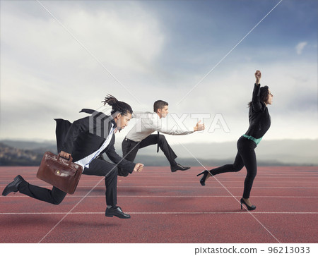 Businesswoman wins a run contest against the competitors. Concept of success 96213033