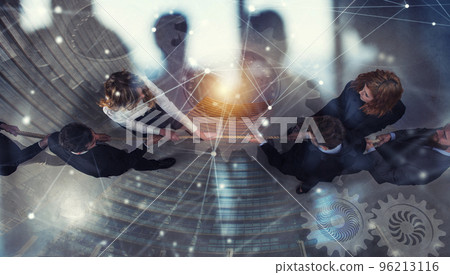 Rival business man and woman compete for the command by pulling the rope. double exposure 96213116