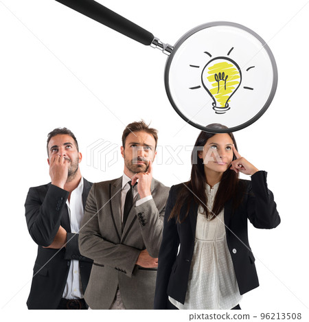 Magnifying glass examines the idea of a young businesswoman 96213508