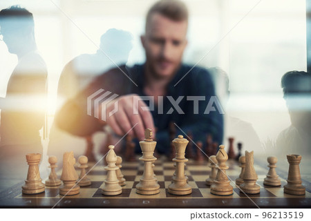 Businessman play with chess game. concept of business strategy and tactic. Double exposure Businessman play with chess game. concept of business strategy and tactic. Double exposure 96213519