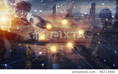 Teamwork and brainstorming concept with businessmen that share an idea with a lamp. Concept of startup. Double exposure 96213660