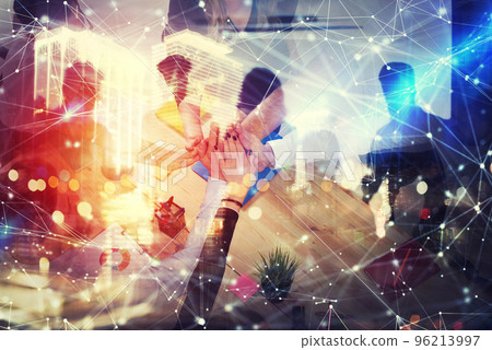 Handshaking business person in office. concept of teamwork and partnership. double exposure with network effects Handshaking business person in office. concept of teamwork and partnership. double exposure with network effects 96213997