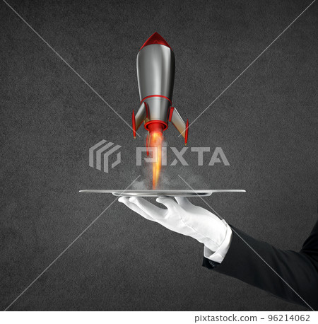 Waiter that holds a tray with a rocket ready to start. Concept of startup Waiter that holds a tray with a rocket ready to start. Concept of startup 96214062