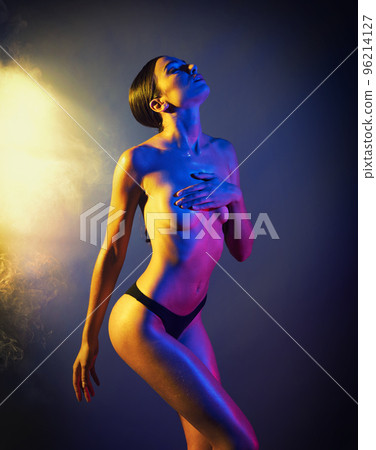 Sexy model with colored lights effect 96214127