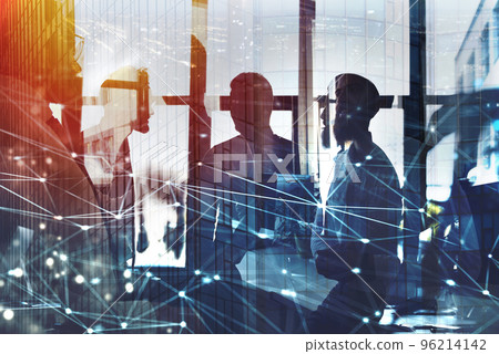 Businessmen that work together in office with network connection effect. Concept of teamwork and partnership. double exposure Businessmen that work together in office with network connection effect. Concept of teamwork and partnership. double exposure 96214142