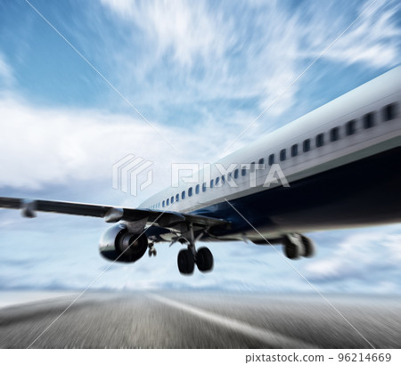Aircraft taking off on a runway Aircraft taking off on a runway 96214669