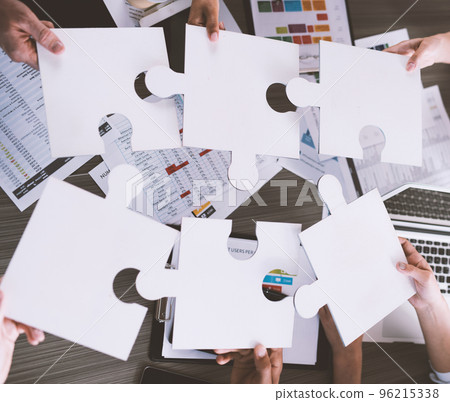 Teamwork of partners. Concept of integration and startup with puzzle pieces 96215338
