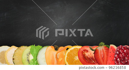 Colourful banner of fruits on blackboard background 96216858