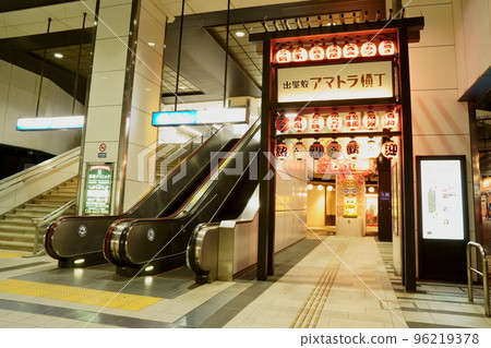 Hanshin Deyashiki Station boarding gate at night Hanshin Deyashiki Station boarding gate at night 96219378