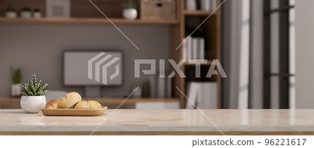 Copy space on white marble tabletop over blurred modern home workspace in background. 96221617