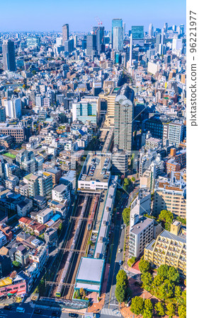 Tokyo cityscape in Japan View of Ebisu Station and Narita Express N`EX (Shibuya in the back, also building of Sakuragaoka redevelopment) Tokyo cityscape in Japan View of Ebisu Station and Narita Express N`EX (Shibuya in the back, also building of Sakuragaoka redevelopment) 96221977