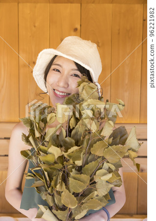 Totou, a young woman who enters the sauna 96221982