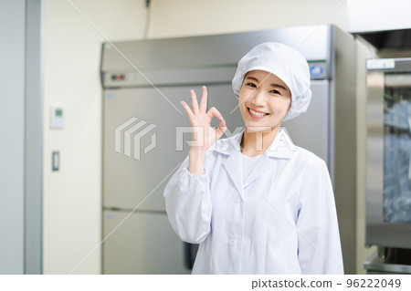 Young female cook (OK sign) Young female cook (OK sign) 96222049