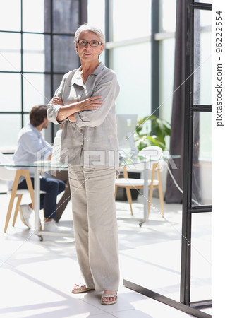 mature woman closeup hands together in the office 96222554