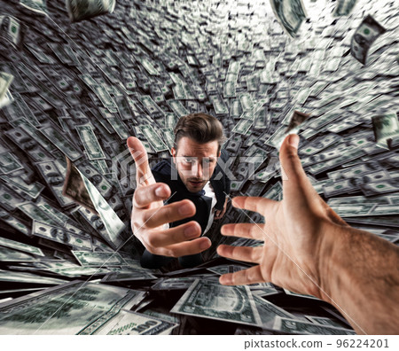 Businessman swallowed by a black hole of money needs help. Concept of failure and economic crisis. 96224201