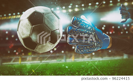 Close up of a goalkeeper catching the ball in the stadium during a football game 96224415