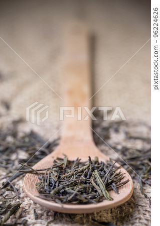 Spoon of dried green tea Spoon of dried green tea 96224626