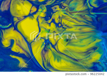 Multicolored paints create a beautiful abstract background 96225842