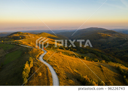 Aerial view of winding road at autumn Aerial view of winding road at autumn 96226743