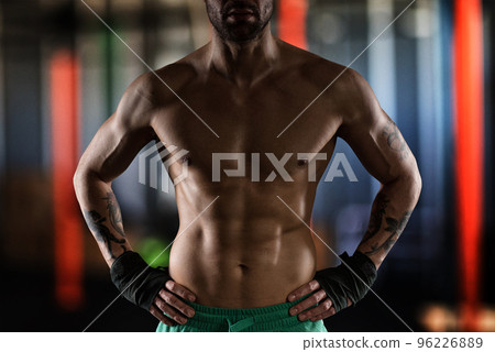 Physique of a man with muscles Physique of a man with muscles 96226889