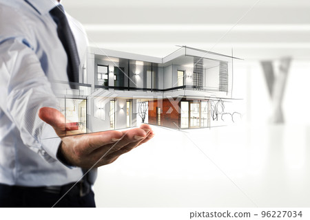 Businessman showing a modern office project 96227034