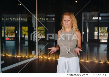 The girl does yoga and is in a state of meditation. The concept of a healthy lifestyle 96227141