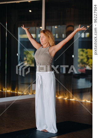 The girl does yoga and is in a state of meditation. The concept of a healthy lifestyle 96227984