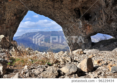 Rock arch and cave entrance Rock arch and cave entrance 96229434